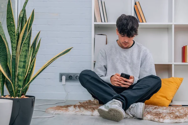 Young Teenager Boy Mobile Phone Home Sitting Comfortably Floor — Stock Photo, Image