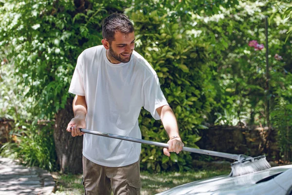 Young Man Washing Car Summer Outdoors — Fotografie, imagine de stoc