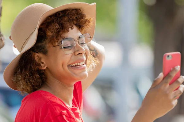 African American Girl Hat Glasses Looking Mobile Phone — Foto de Stock