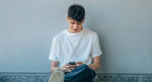 Teenager Sitting Street Mobile Phone — Foto de Stock