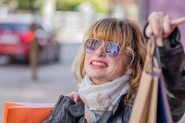 Happy Middle Aged Woman Shopping Bags — Stok fotoğraf