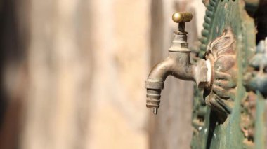 faucet dripping with leak or loss of water