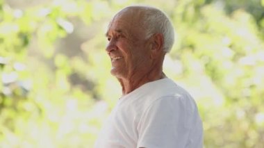 senior man doing sports or exercises outdoors