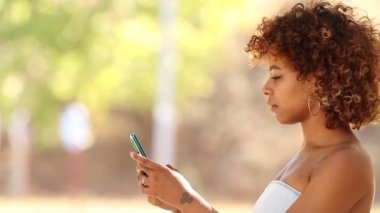 girl with mobile phone and expression of success