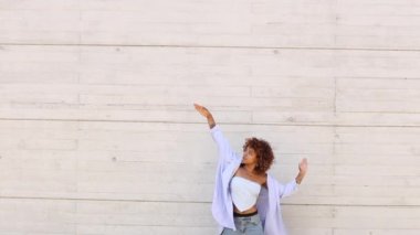 girl dancing modern urban dance on the street