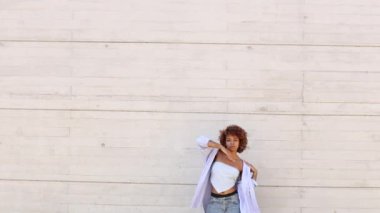 girl dancing modern urban dance on the street