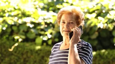 grandmother senior woman talking on mobile phone