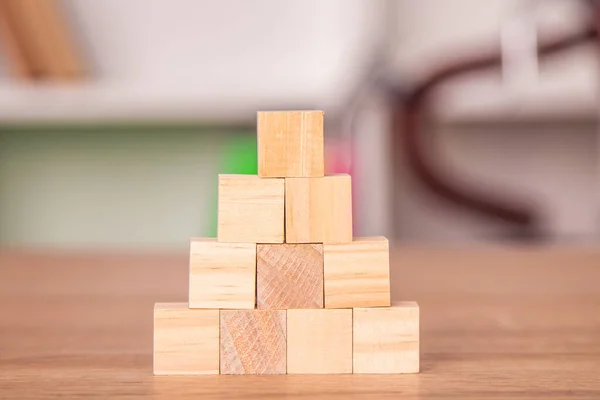 stacked natural wood blocks, puzzle