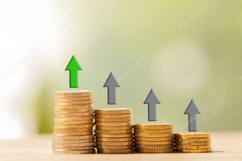 stacked coins on ladder with arrows up