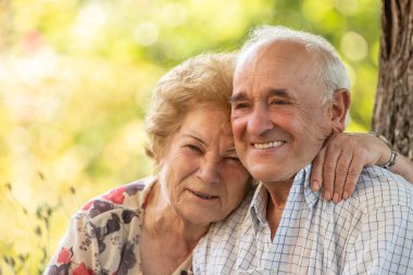 senior couple smiling happy outdoors