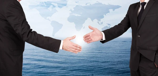 Hands Businessmen Greeting Each Other Map — Stock Photo, Image