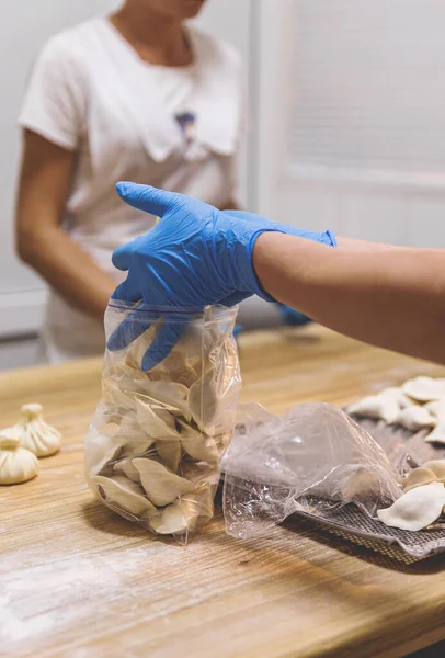 The process of preparing food from dough in the kitchen. High quality photo