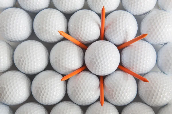 Golfballen en tees — Stockfoto