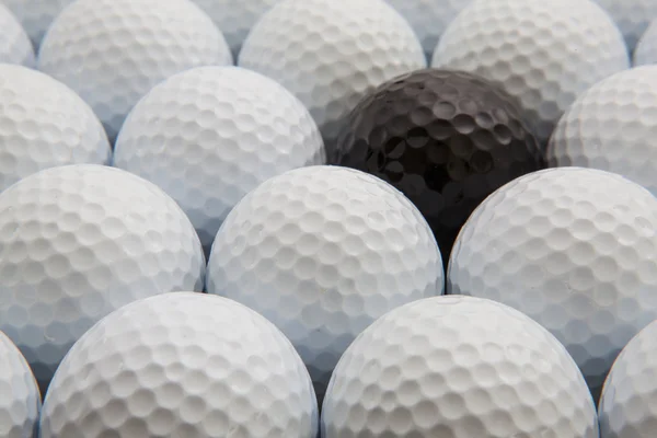 Различные мячи для гольфа — стоковое фото