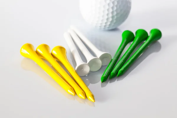 Equipos de golf en la mesa — Foto de Stock