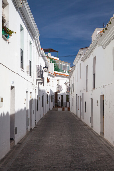 Typical white houses in the narrow street of Mijas - Andalusia, Spain