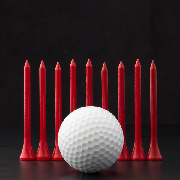 Pelotas de golf en el fondo negro —  Fotos de Stock