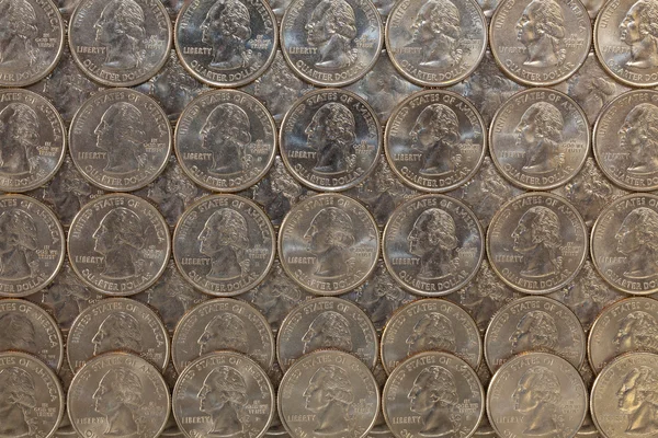 The same US coins on a glass table — Stock Photo, Image