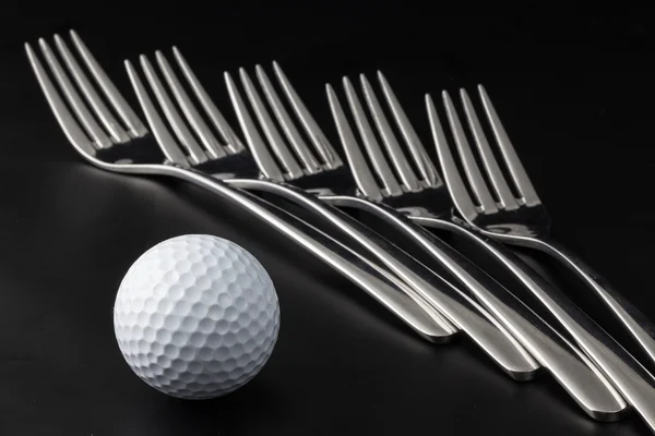 Fourchettes et balles de golf — Photo