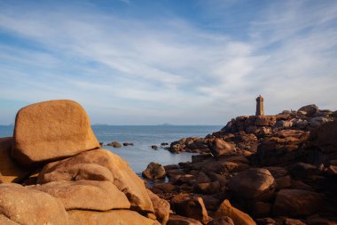 Lighthouse on the Pink Granite Coast. It is a stretch of coastline in the Cotes d Armor departement of northern Brittany, France. It stretches for more than thirty kilometres.