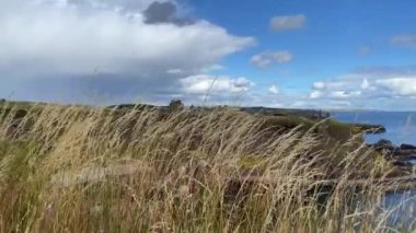 Dunnottar Castle is a ruined medieval fortress located upon a rocky headland on the north-eastern coast of Scotland, about 2 miles south of Stonehaven.
