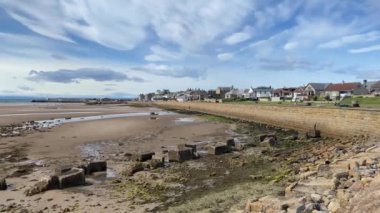 Port in Findhorn, Scotland.Findhorn is a village in Moray, Scotland. It is located on the eastern shore of Findhorn Bay and immediately south of the Moray Firth.