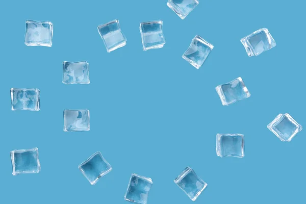 Ice Cubes Isolated Blue Background Place Text Top View Simulated — Fotografia de Stock