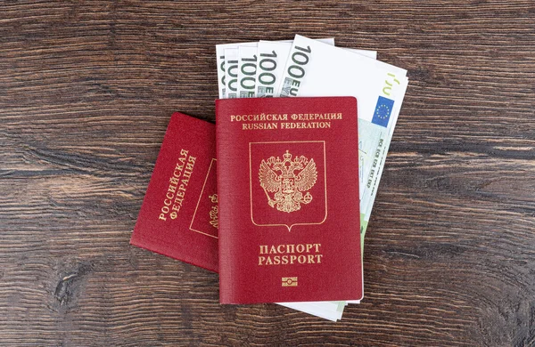 Russian Biometric Passports European Currency Banknotes Travel Concept — Fotografia de Stock