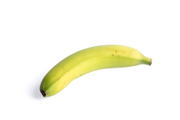 Niedojrzały Banan Białym Tle Cieniem Przestrzeń Kopiowania — Zdjęcie stockowe