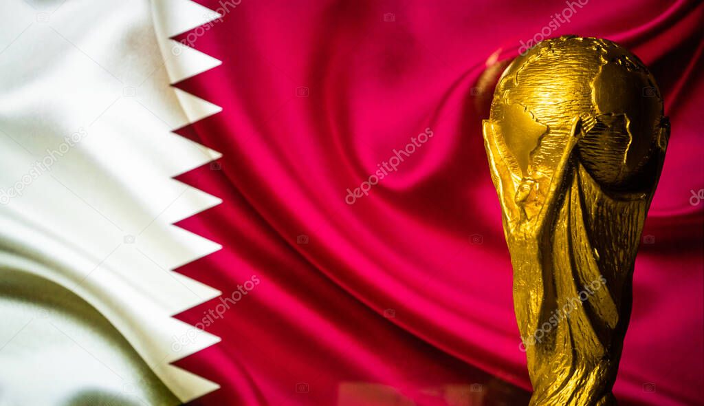 October 6, 2021 Doha, Qatar. FIFA World Cup Cup against the background of the Qatar flag.