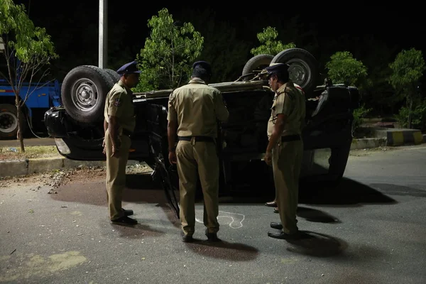 Indian Police at Accident car