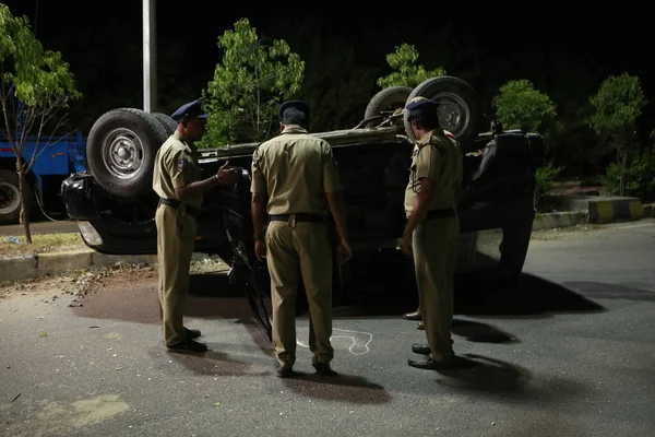 Indian Police at Accident car