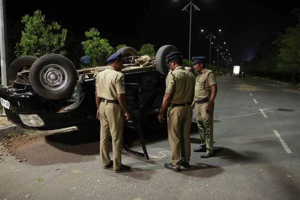 Indian Police at Accident car