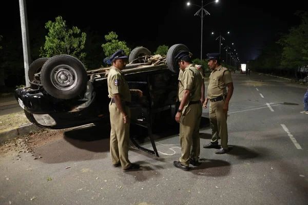 Indian Police at Accident car