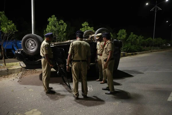 Indian Police at Accident car