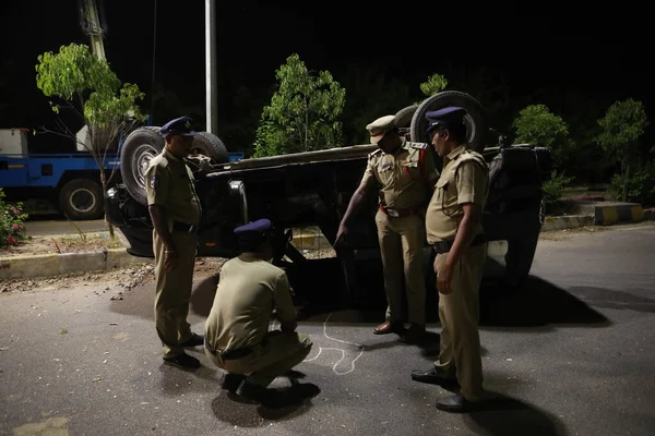 Indian Police at Accident car