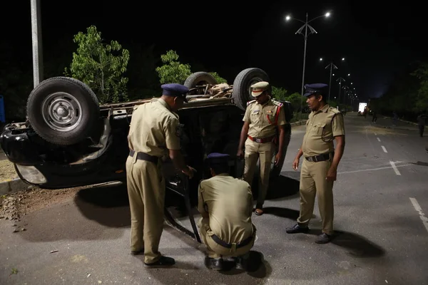 Indian Police at Accident car