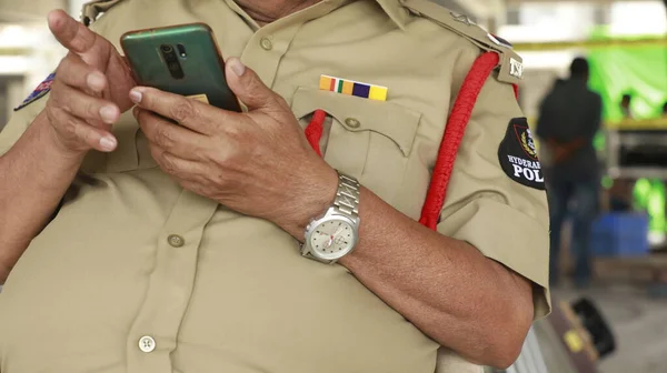 Police Hand with Phone