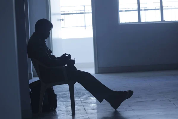 silhouette of man at Door