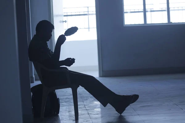 silhouette of man at Door