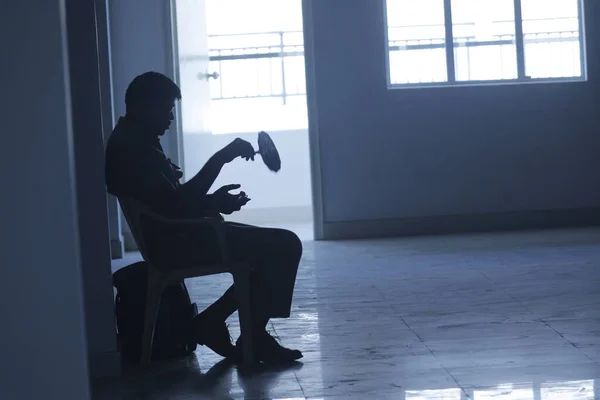 silhouette of man at Door