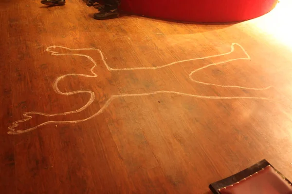 Chalk Outline Of Dead Body On Crime Scene
