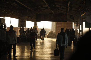 Silhouettes of people on Platform