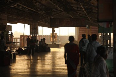 Silhouettes of people on Platform