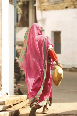 Rear view of a old woman