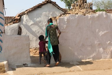 Indian Mother and kid watching Hyderabad India 2nd Aug 2022