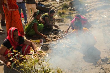 Indian Female Devotees at cooking at temple