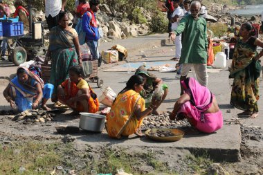 Indian Female Devotees at cooking at temple
