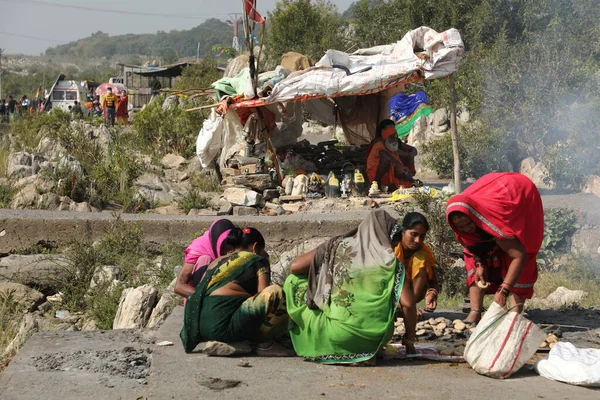 Indian Female Devotees at cooking at temple
