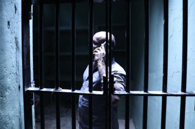 Male hands with cell phone in jail Hyderabad India 2nd Aug 2022